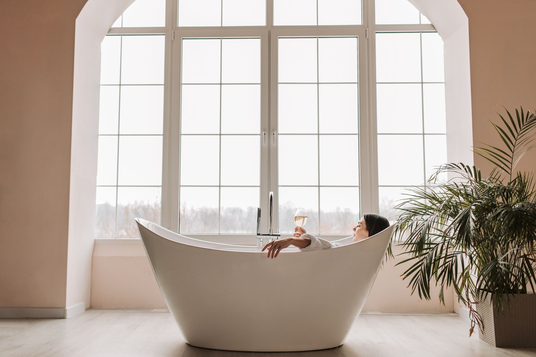 A woman relaxing during a luxury home spa treatment